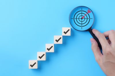 Goal,Achievement,Steps,And,Target,Concept.,Wooden,Blocks,With,Checkmarks