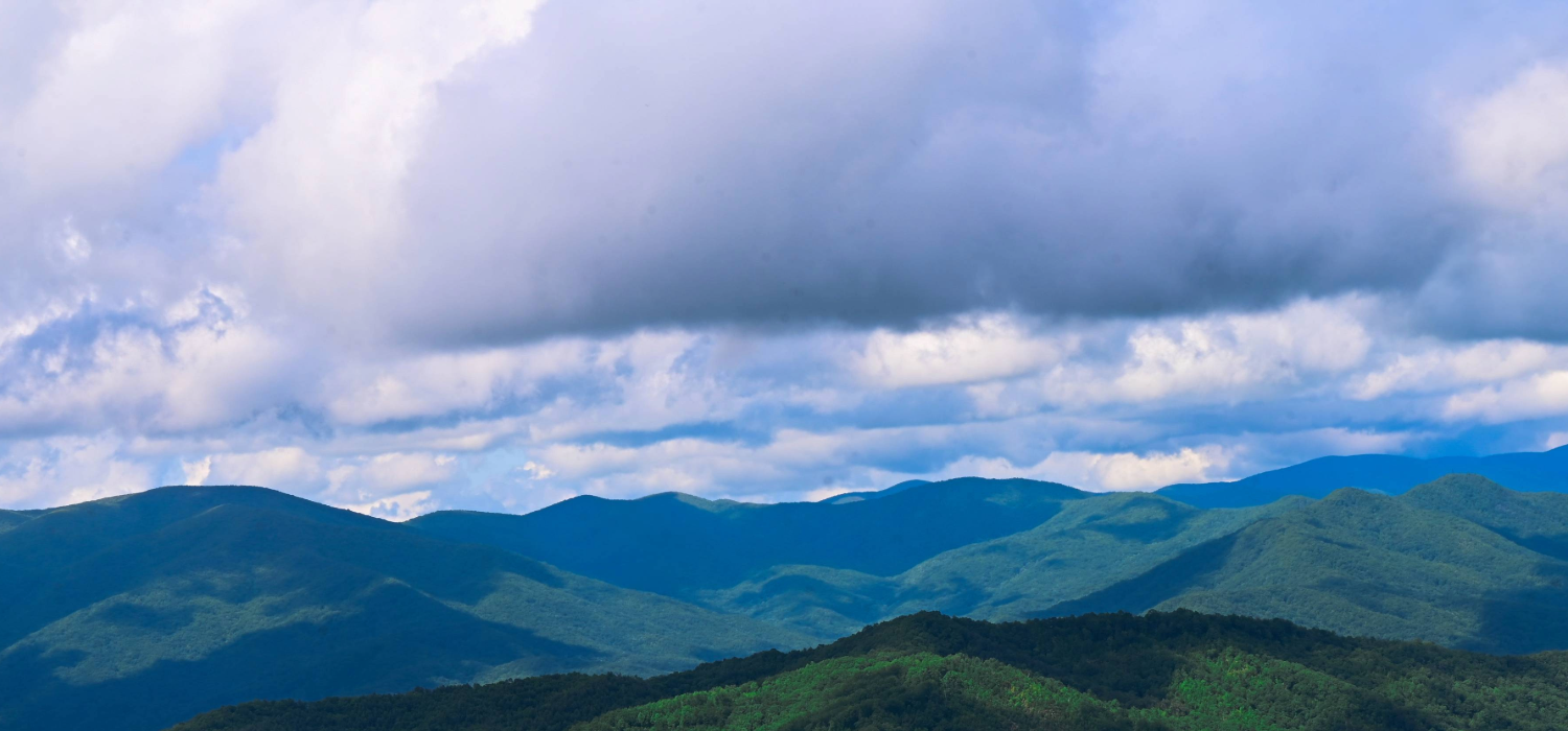 The rolling mountains of Graham County, North Carolina where county health departments are separated by literal mountain chains.